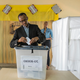 Rwanda’s president Paul Kagame voting in Friday’s referendum.